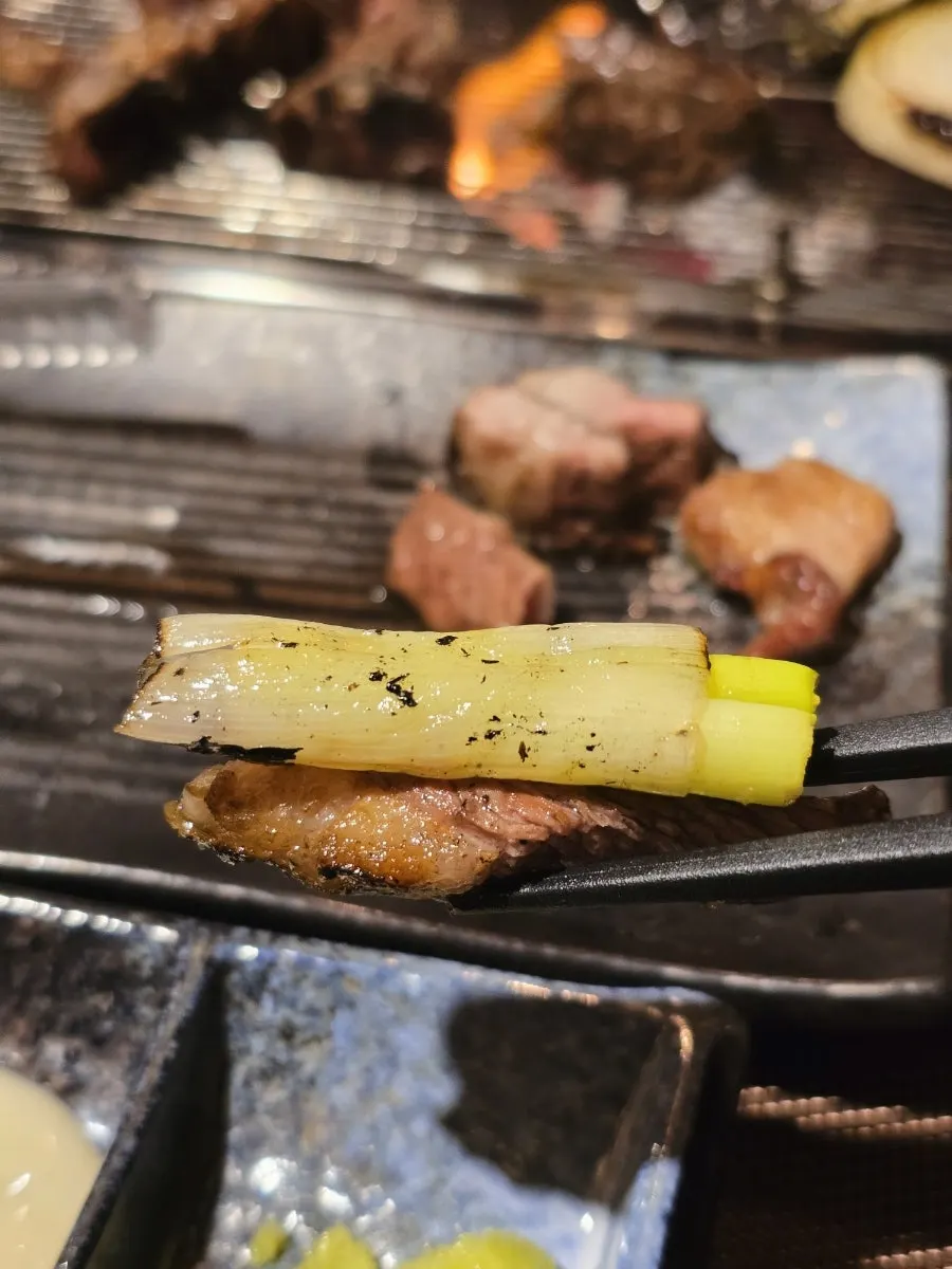 Grilled tomato and pineapple served alongside