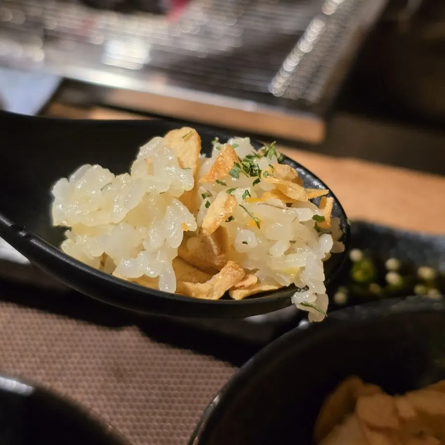 Garlic rice topped with garlic chips