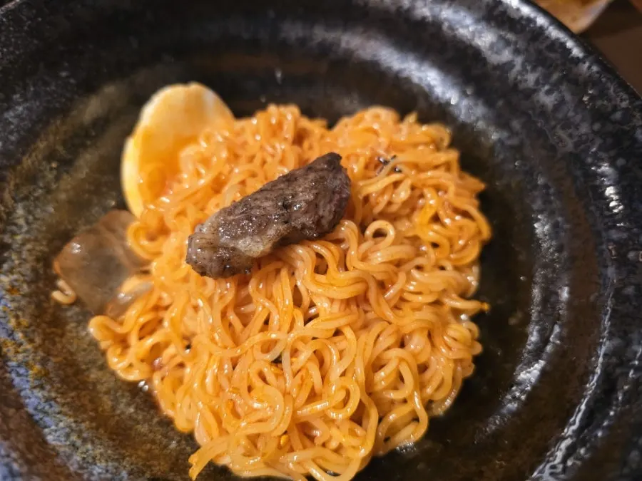 Bibimmyeon served alongside an Earl Grey highball
