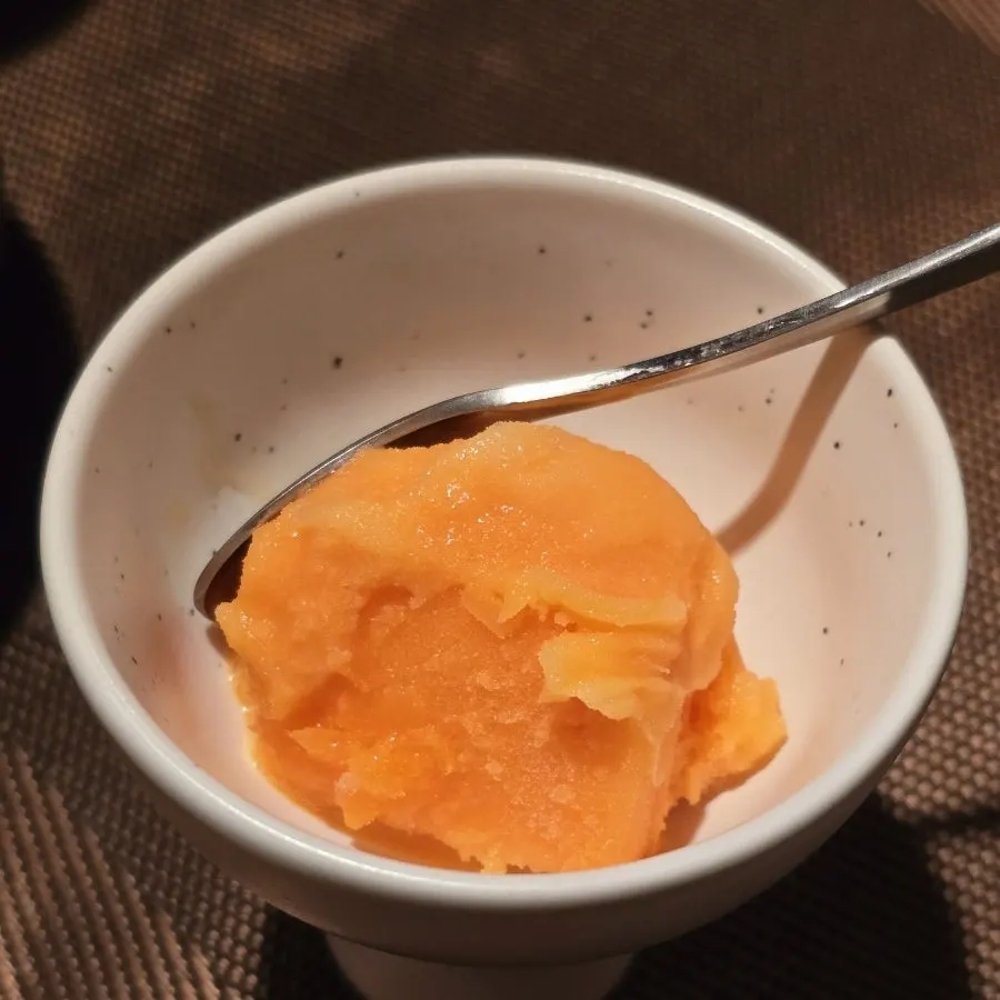 Orange sherbet served for dessert