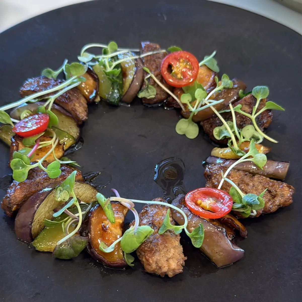 Ssigangjang Korean beef tteokgalbi served with eggplant and zucchini