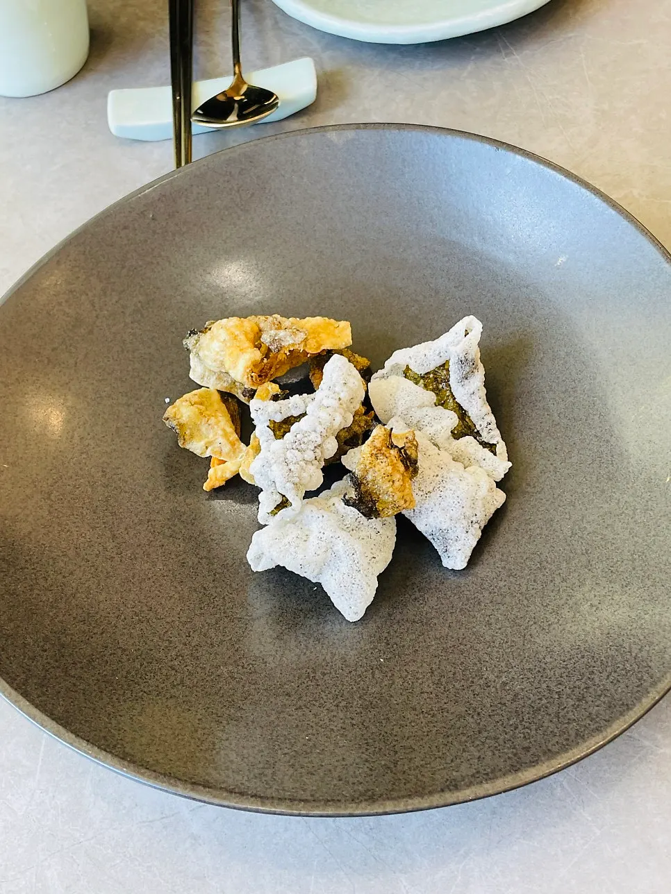 Welcome dish of pollack chips and gim-bugak