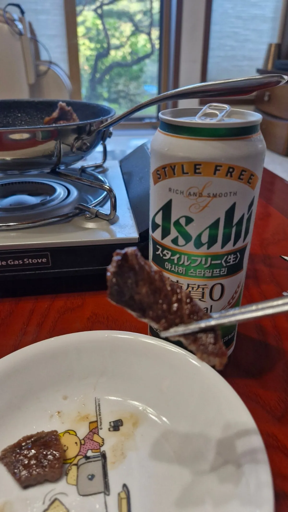 Hanwoo kkotdeungsim cooking in the frying pan