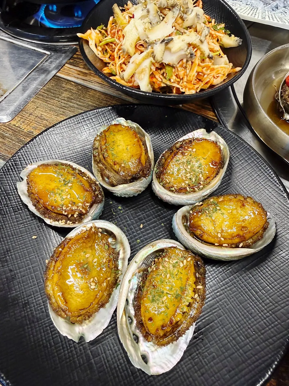 A plate of Wando Sanghoe's butter-grilled abalone
