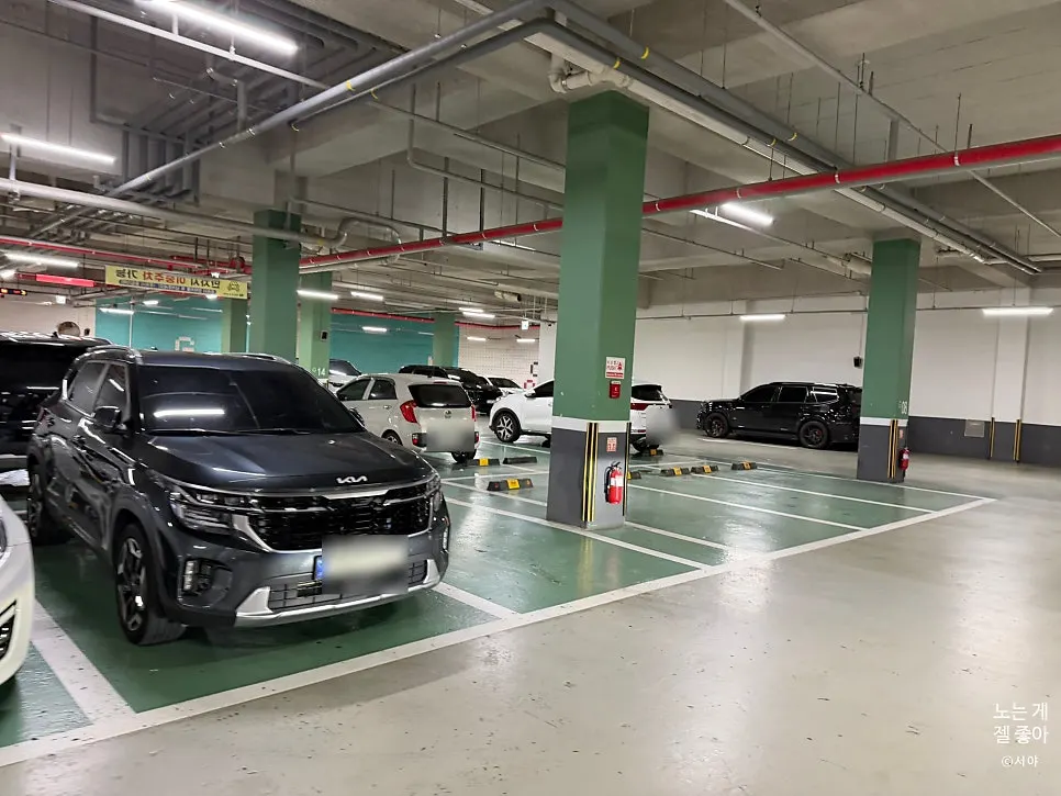Visitor-only parking lot on the basement floor of Oslo Park