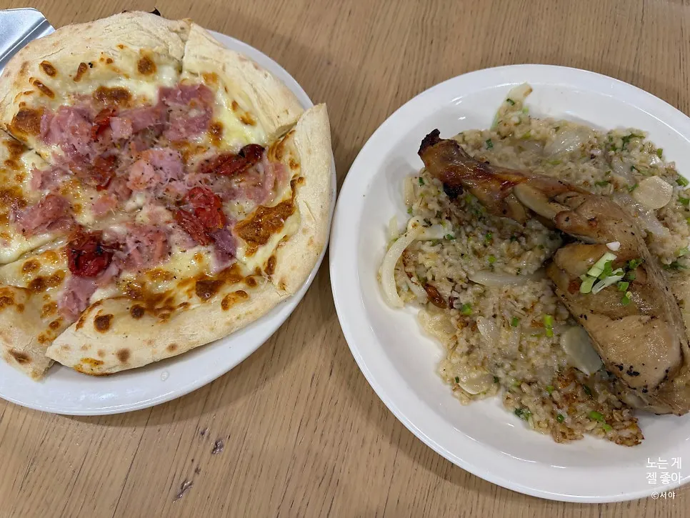 Jambon pizza and Kung Pao chicken pilaf served together