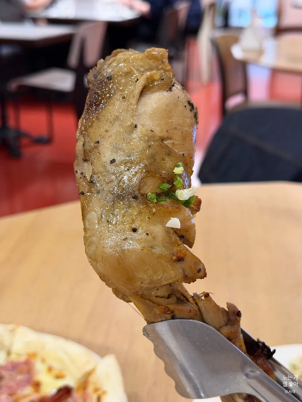 A sous vide chicken thigh the size of a palm