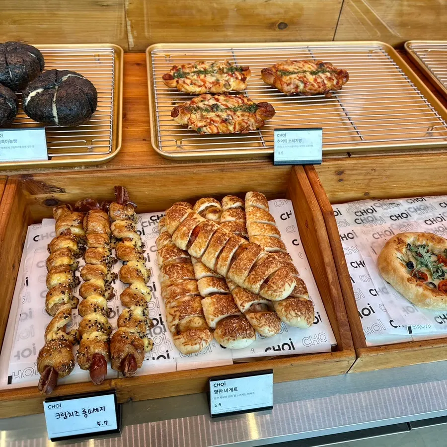 Display of pastries including almond croissant and pain au chocolat