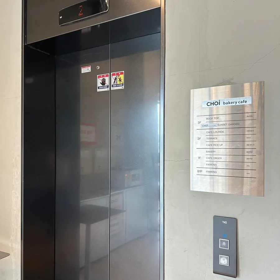 Interior of Choi Main Branch's 2nd floor with a floor-to-ceiling view of the Nakdong River
