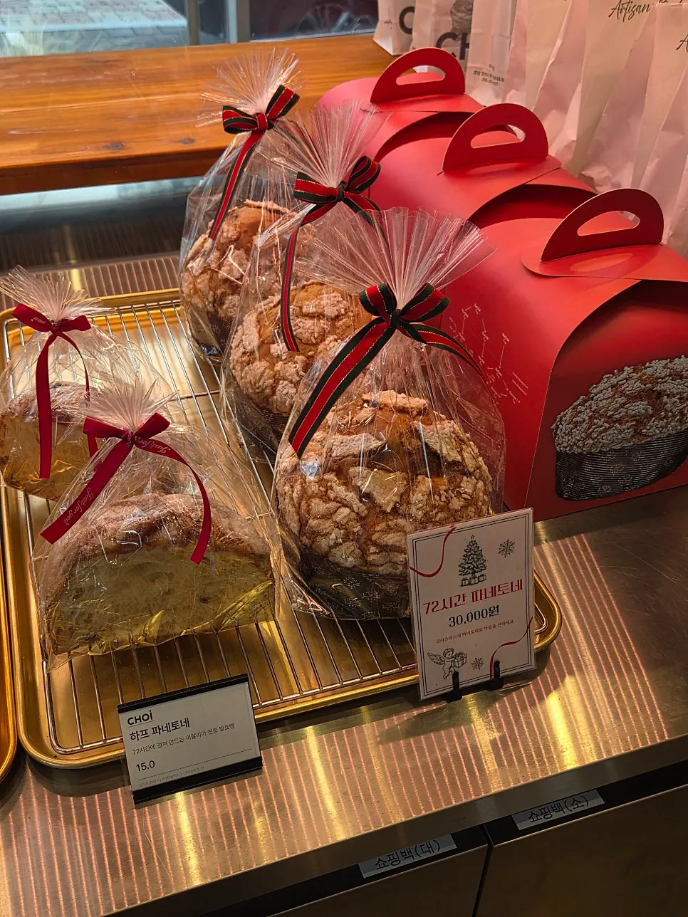 Display case with croissants showing delicate layers
