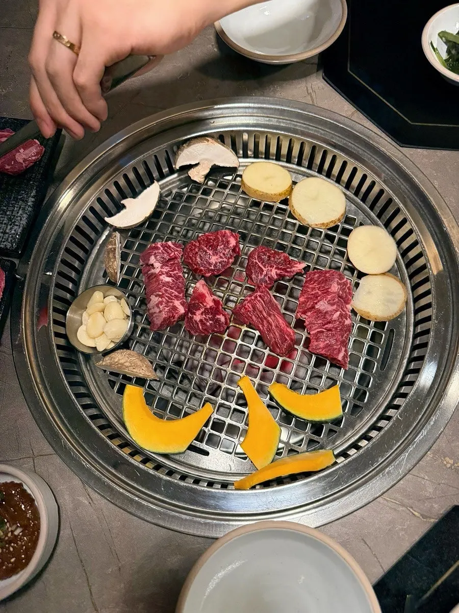 Tosi and anchang cuts placed on the charcoal grill