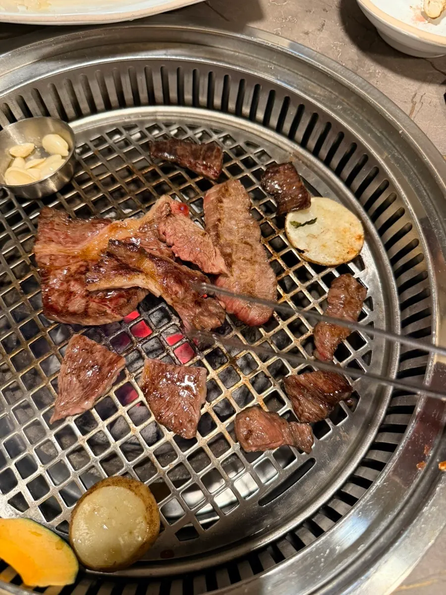 Grilled deungsim served with wrap greens