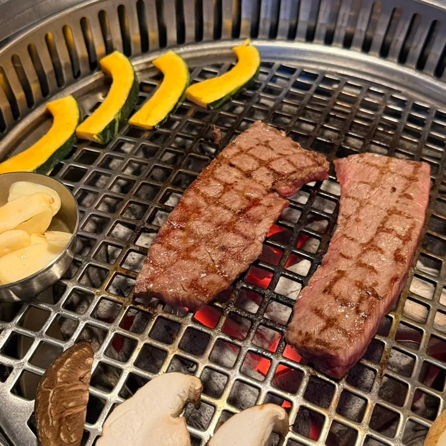 Basic side dish spread with pickles, lettuce wraps, and grilling vegetables