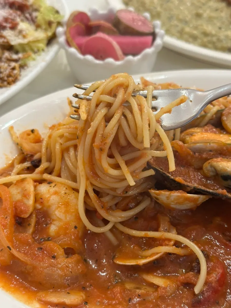 Close-up of seafood tomato pasta noodles and sauce
