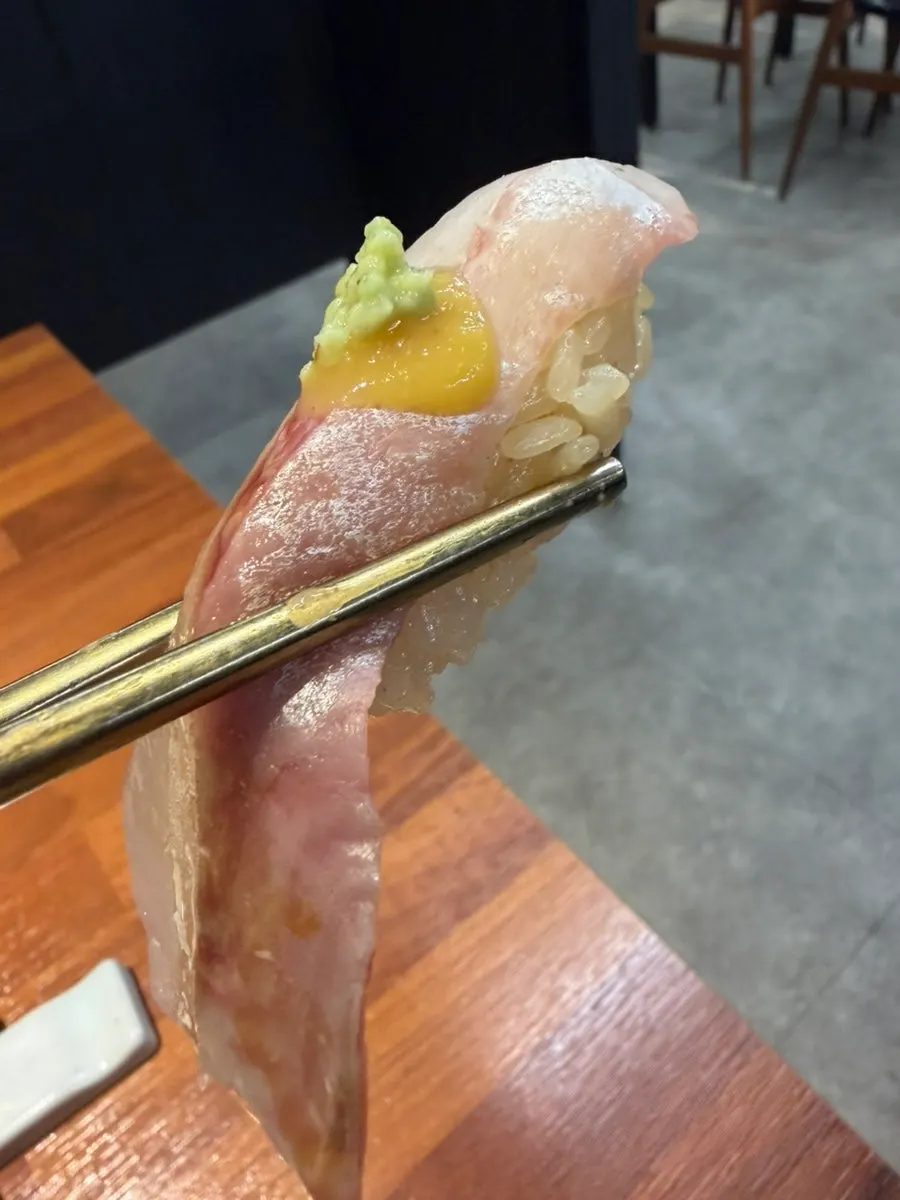 Yellowtail sushi topped with smiso sauce