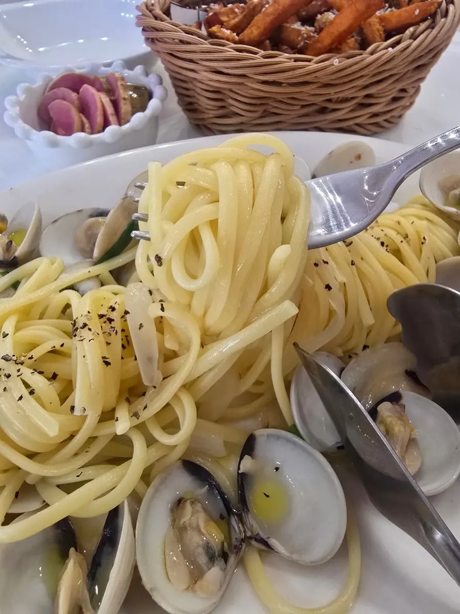Pasta with noodles and sauce visible at Bueokgan Restaurant