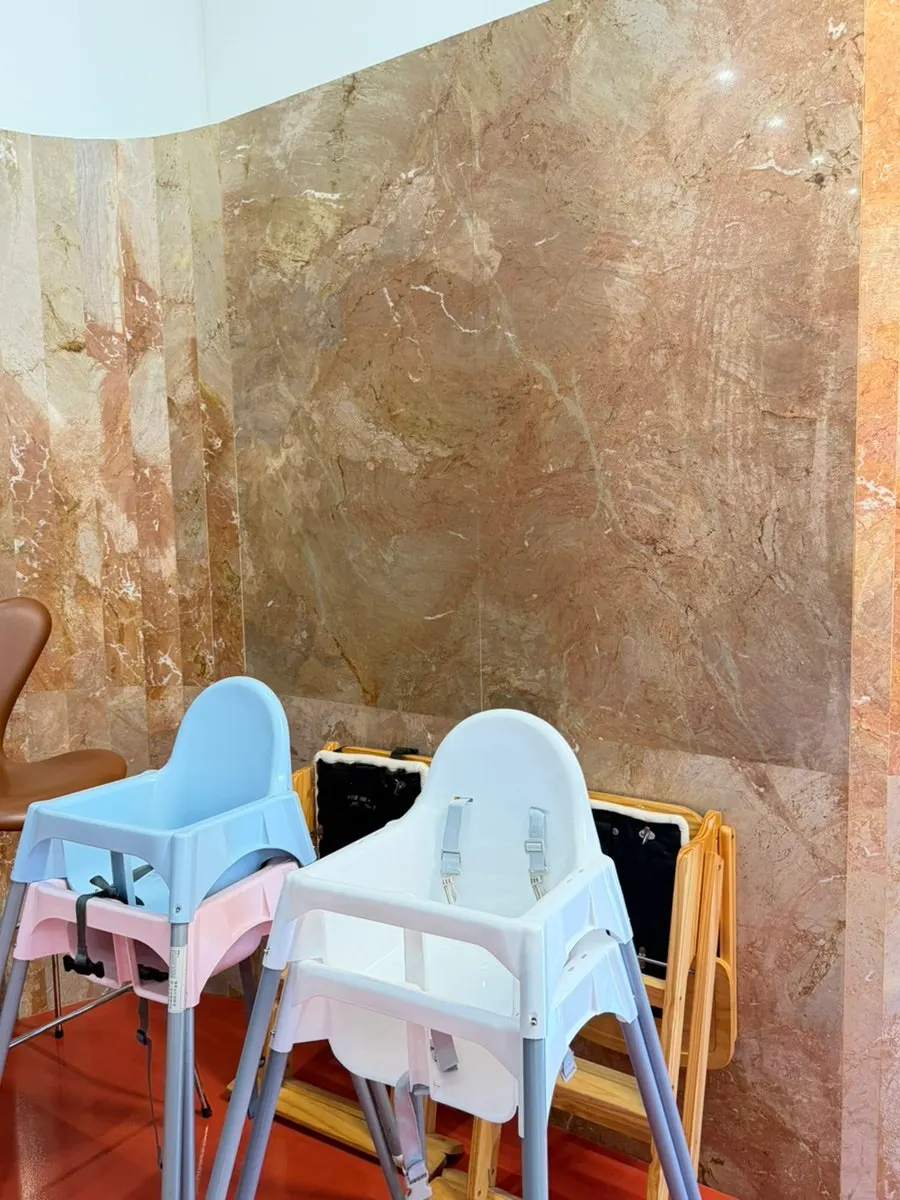 Family table seated with a baby