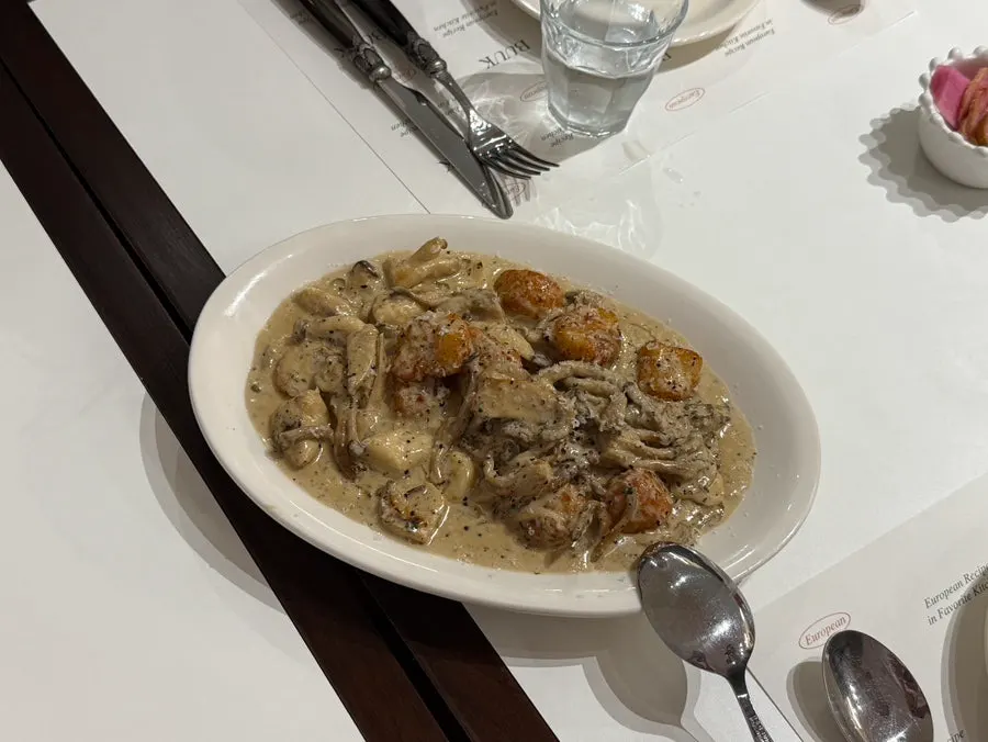 A plate of truffle mushroom cream gnocchi