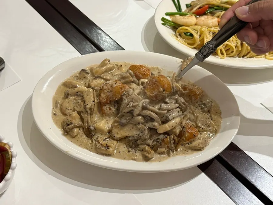 Chewy gnocchi coated in thick cream sauce