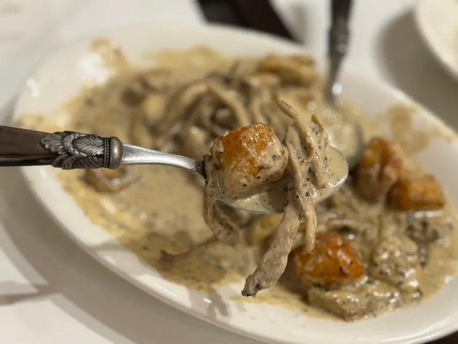 Final plate of truffle mushroom cream gnocchi