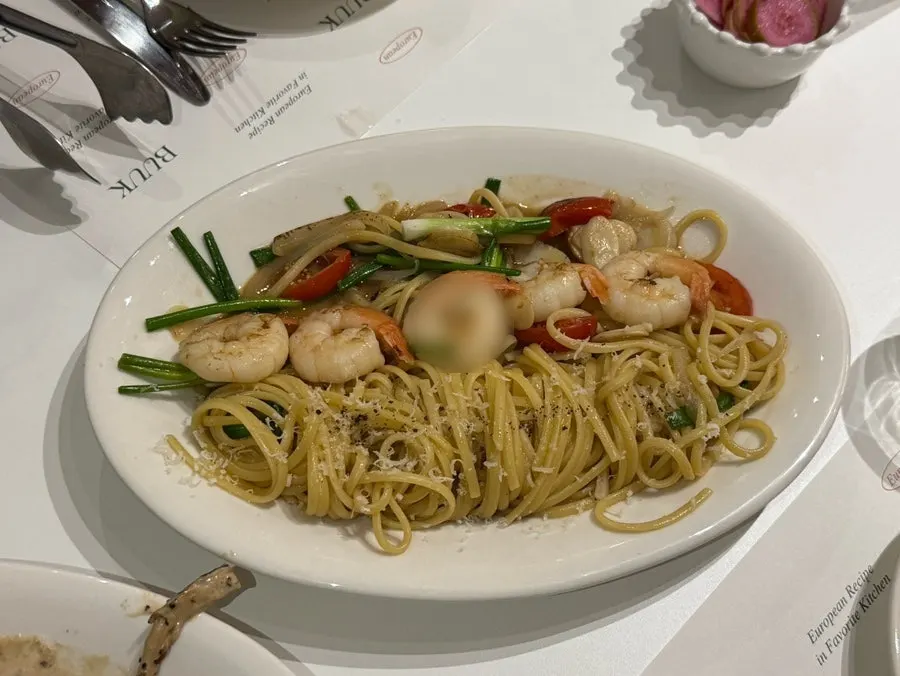 A plate of shrimp anchovy oil pasta