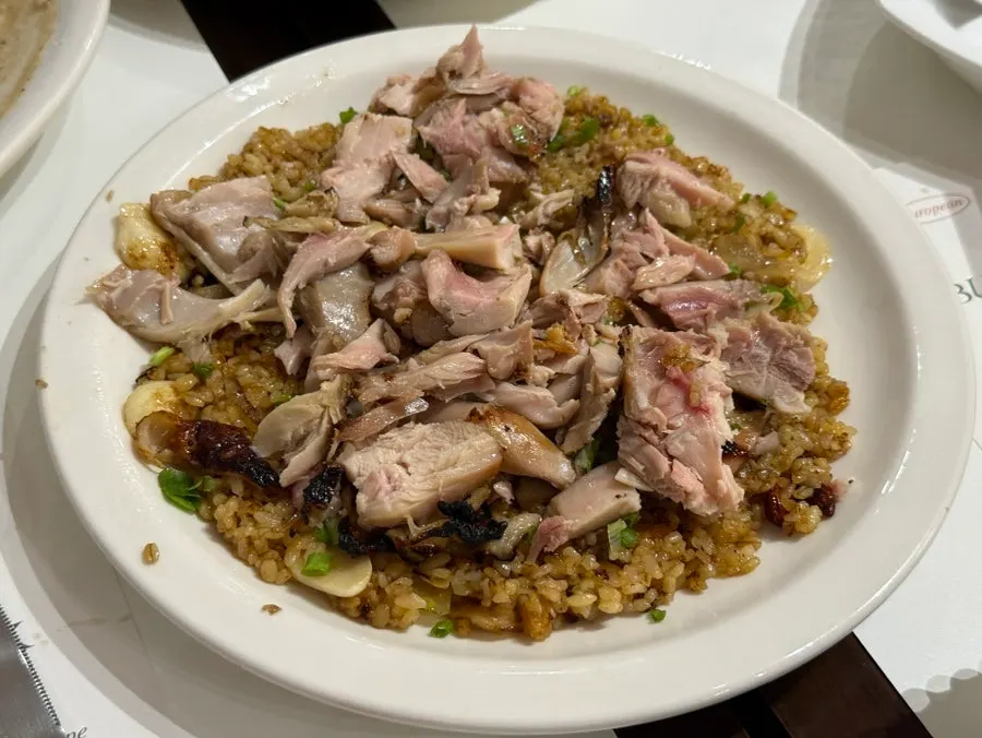 Rice grains coated in seasoning in the pilaf