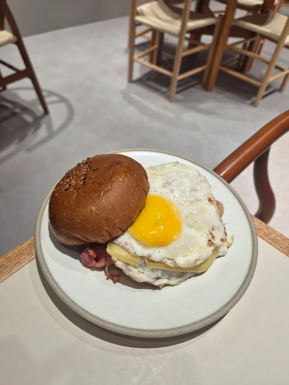 A plate of bacon egg rolls