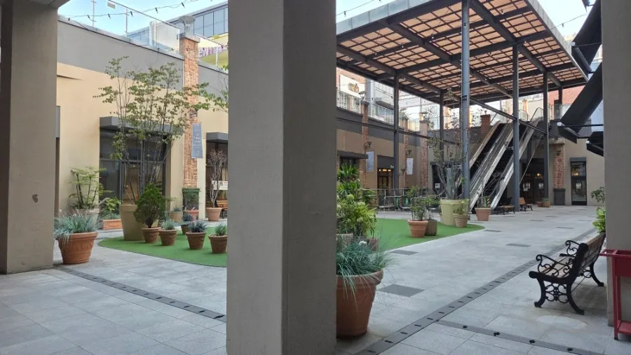 The café exterior seen right after coming up the escalator