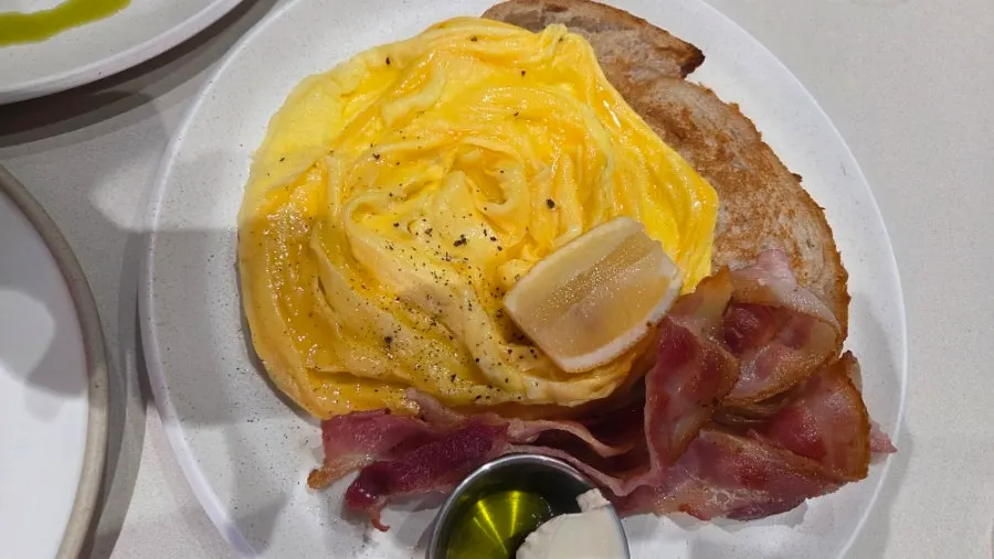 A plate of bacon scramble toast