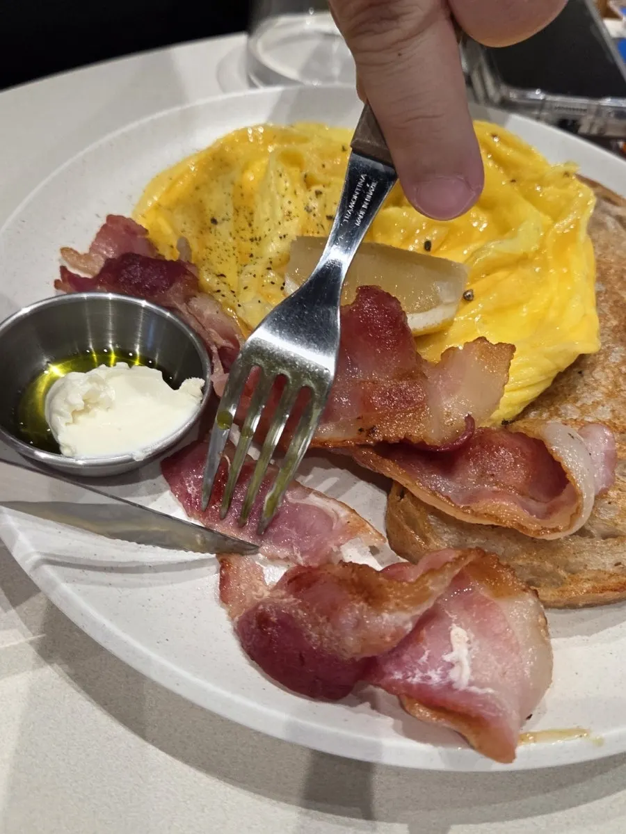 Close-up of scrambled eggs and bacon