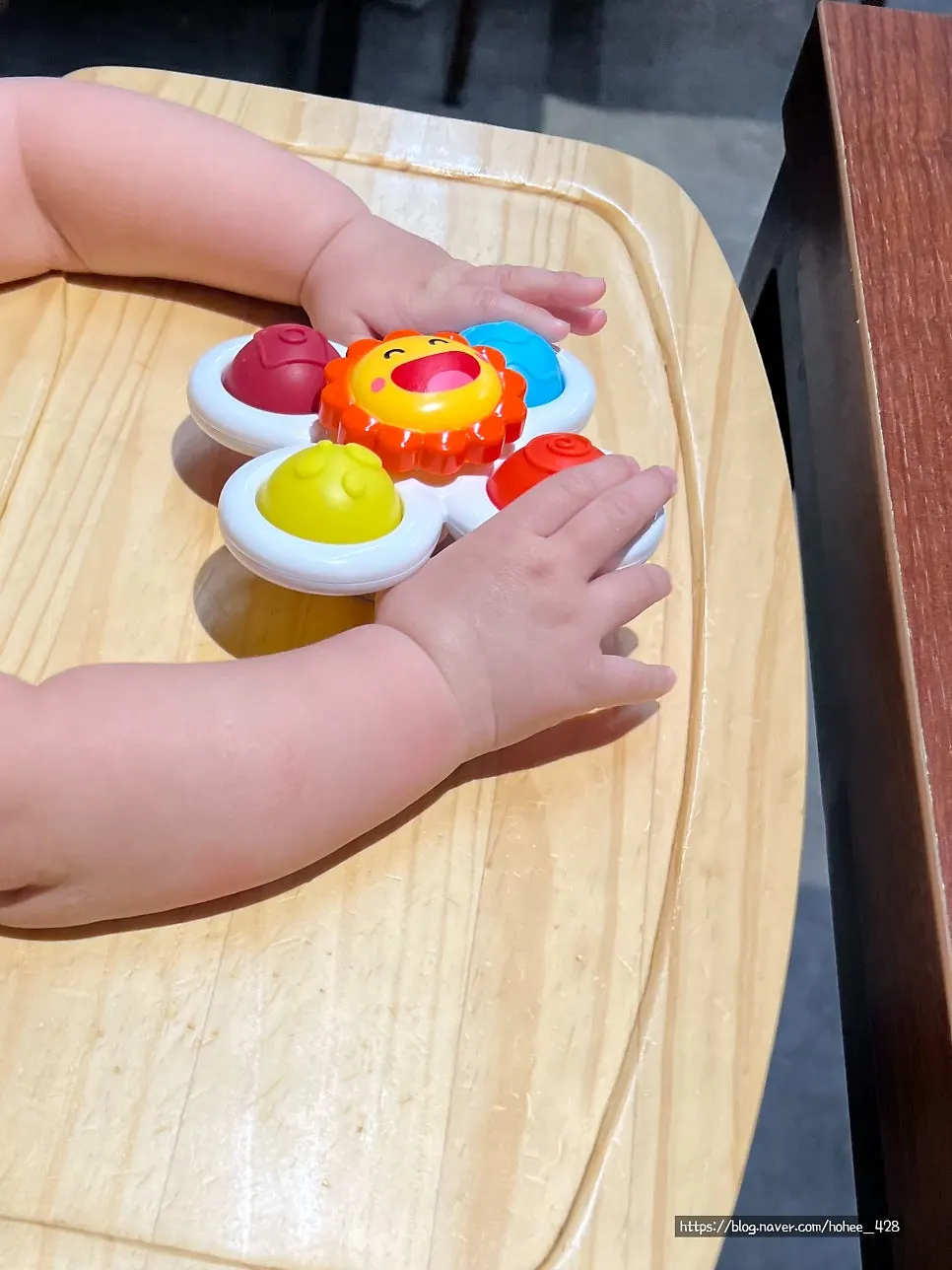 Dining table with a baby chair and spinner