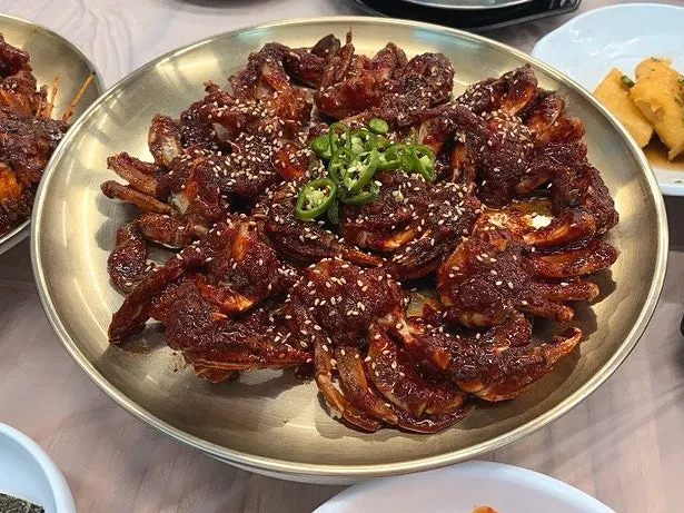 Generously served yellow crab jang set