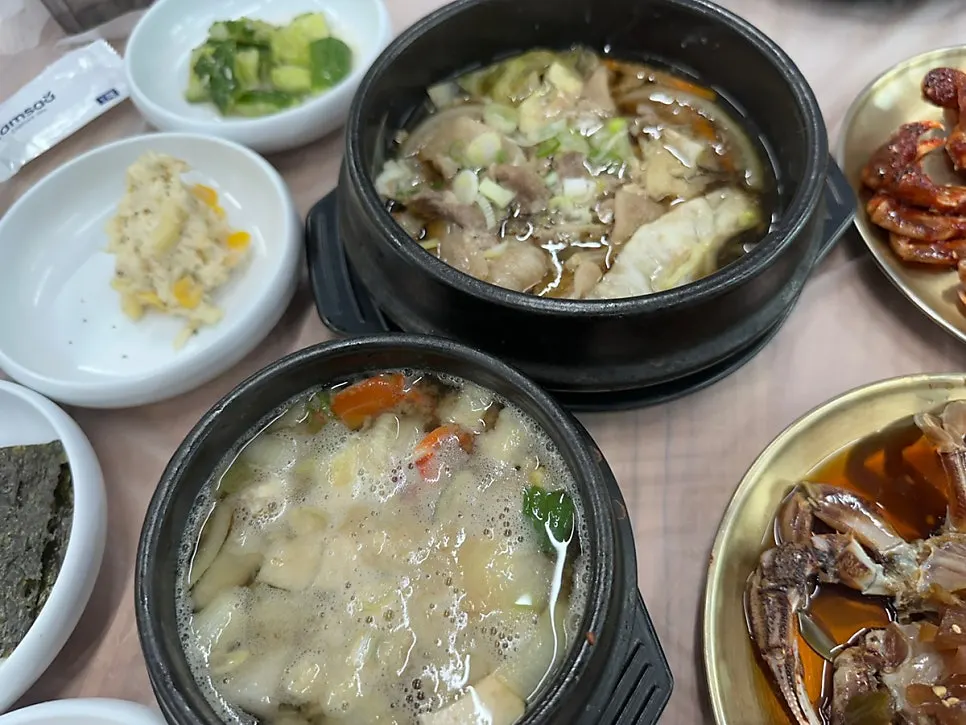 Set side dishes including cucumber salad and corn salad