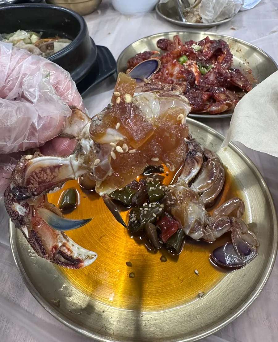 Soy and spicy marinated crab served half and half