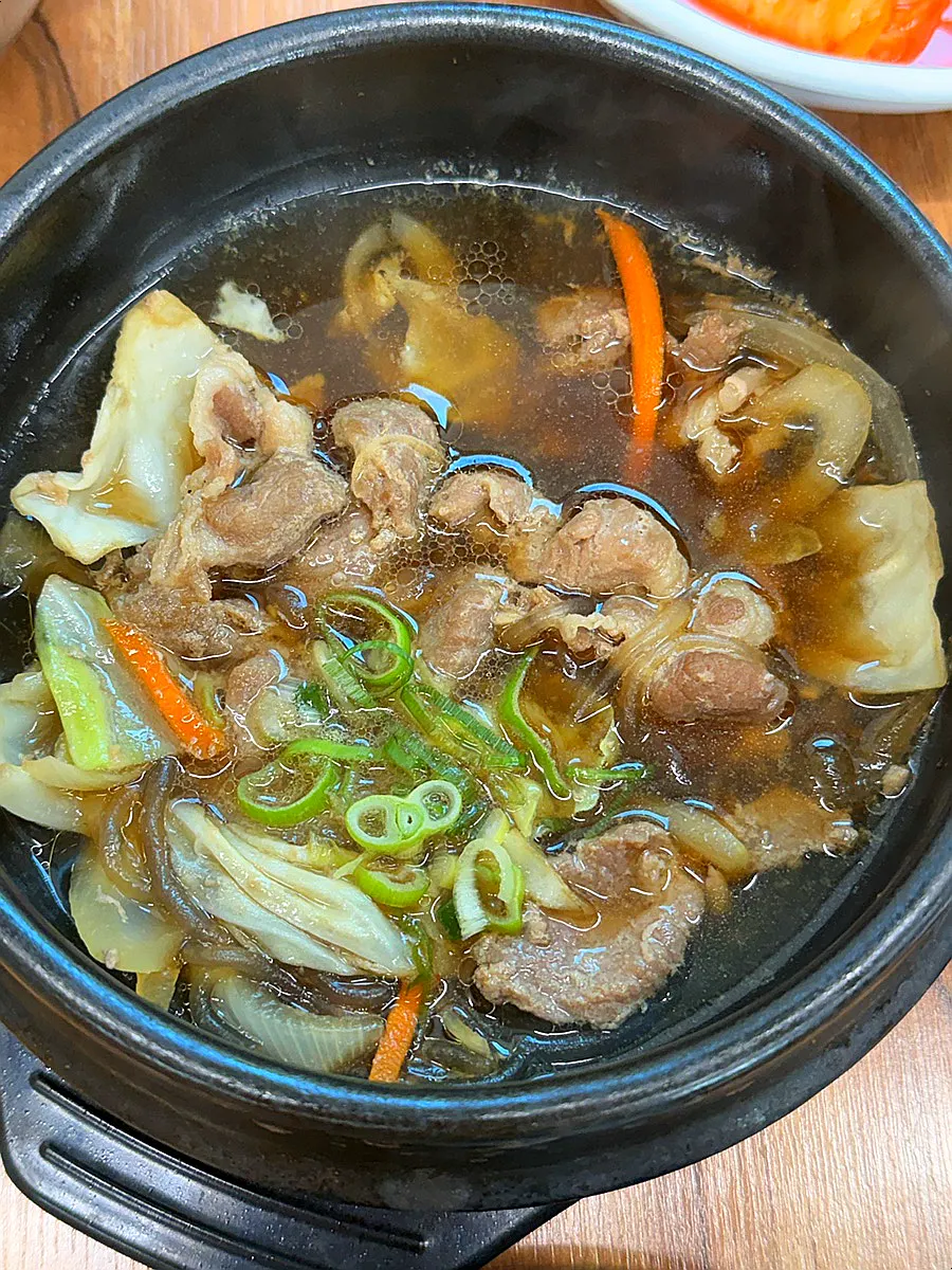 Hotpot bulgogi served alongside the crab
