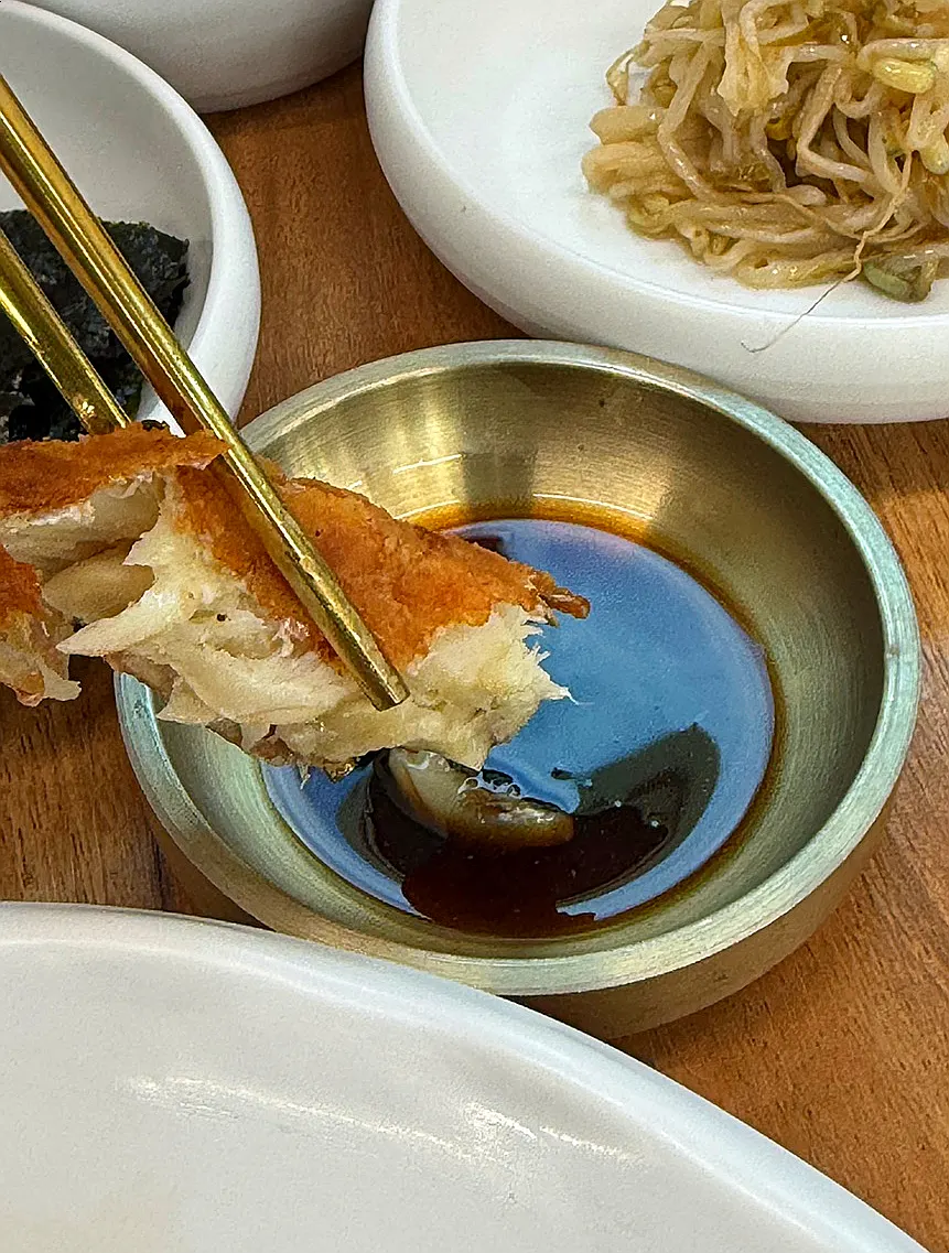 Grilled fish dipped in soy sauce