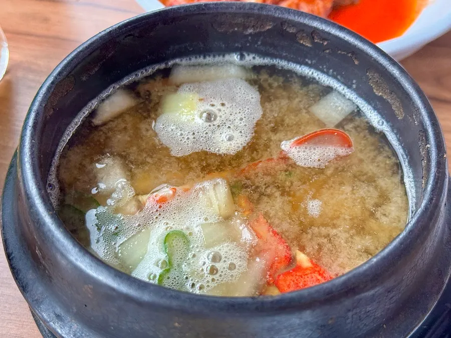 Water poured over the scorched rice left in the pot