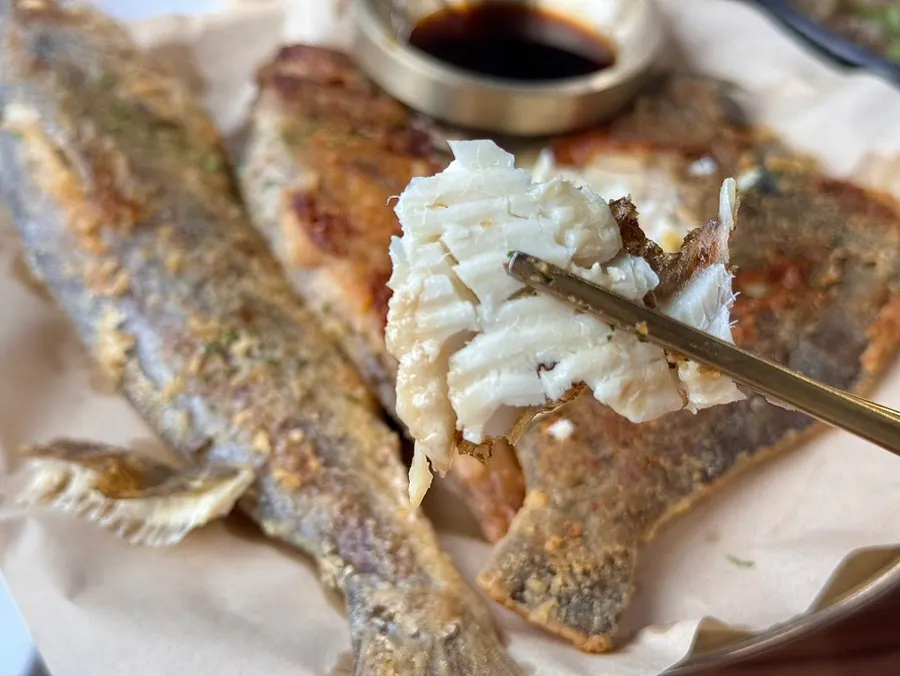 Plate of three kinds of grilled fish served together
