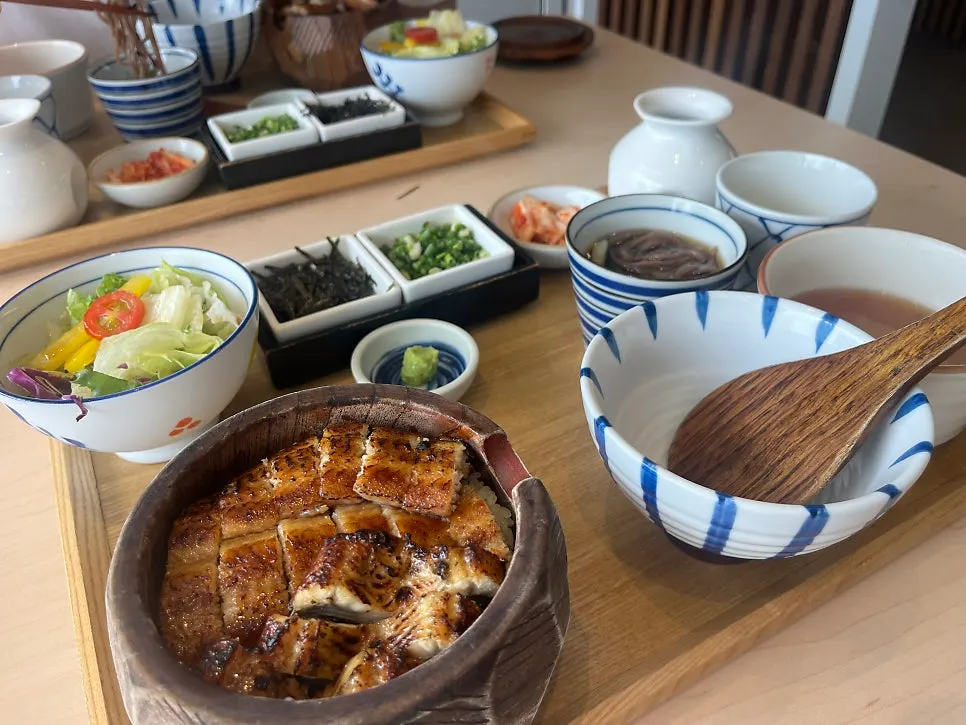Eel and side dishes in a wooden ohitsu box