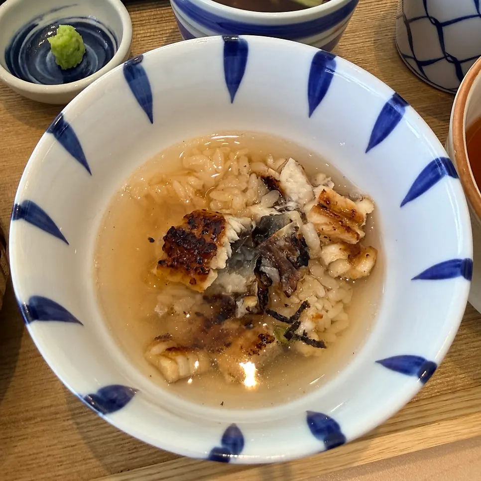 Side dishes of buckwheat noodles, kimchi, and steamed egg