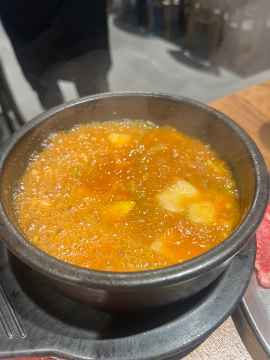Stone pot doenjang jjigae loaded with beef