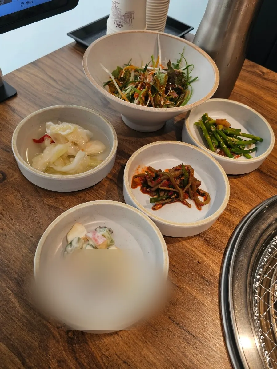 Neatly arranged side dishes served with meat