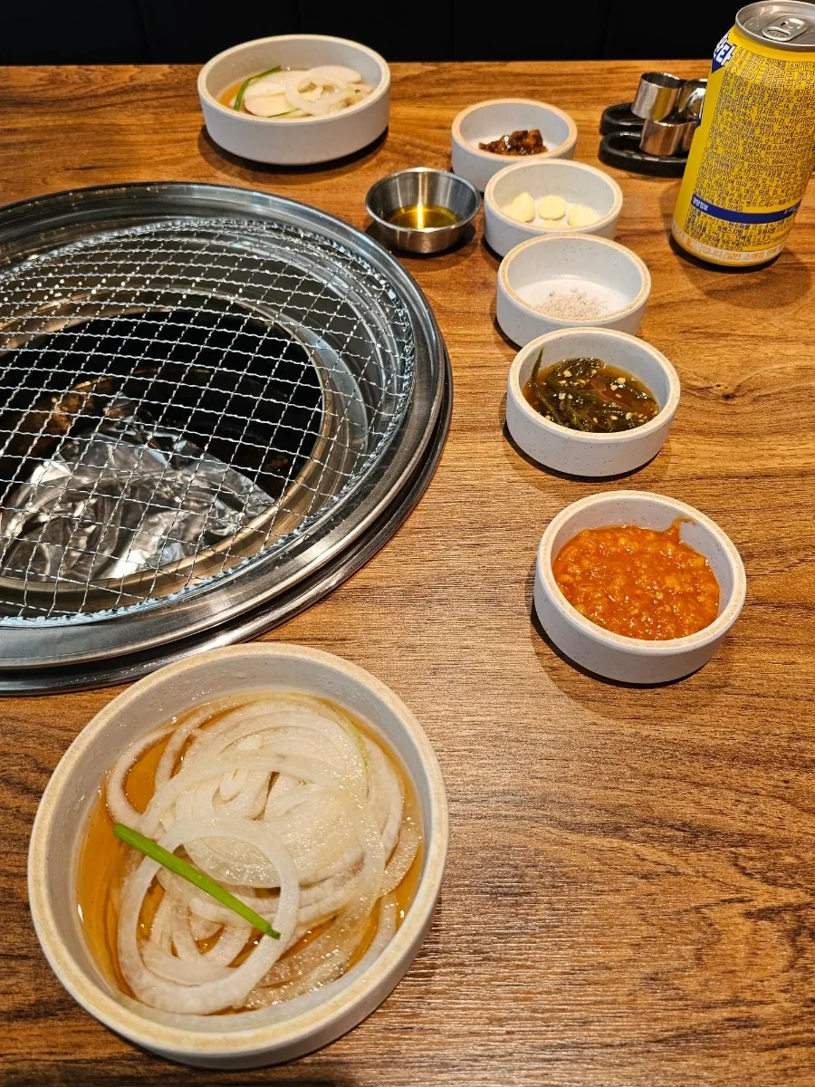 Plate of scallion strips and ssamjang side dishes