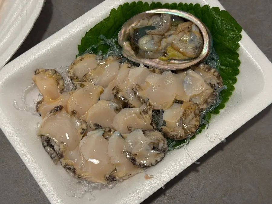 A generous plate of halibut sashimi