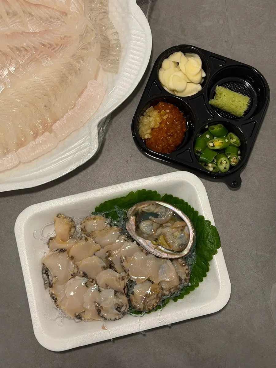 2-person raw fish takeout set with abalone and nurungji squid sundae from Yangyangbada
