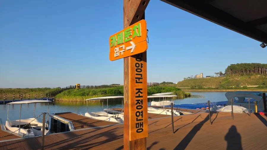 Outdoor deck of floating Cafe Dunchi over the river