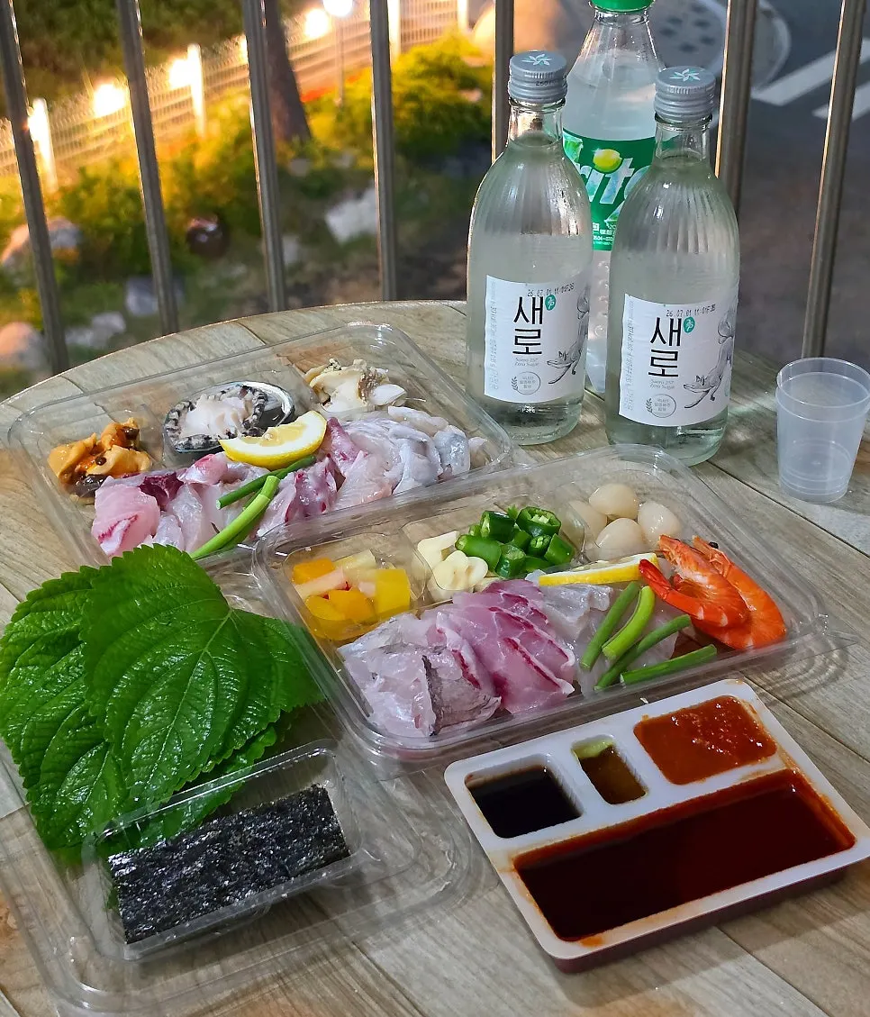 Ordered assorted sashimi for two, packed container