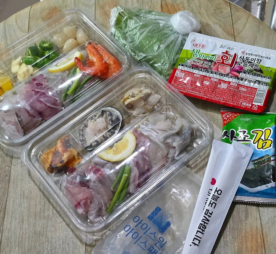 Full spread of the opened assorted sashimi for two