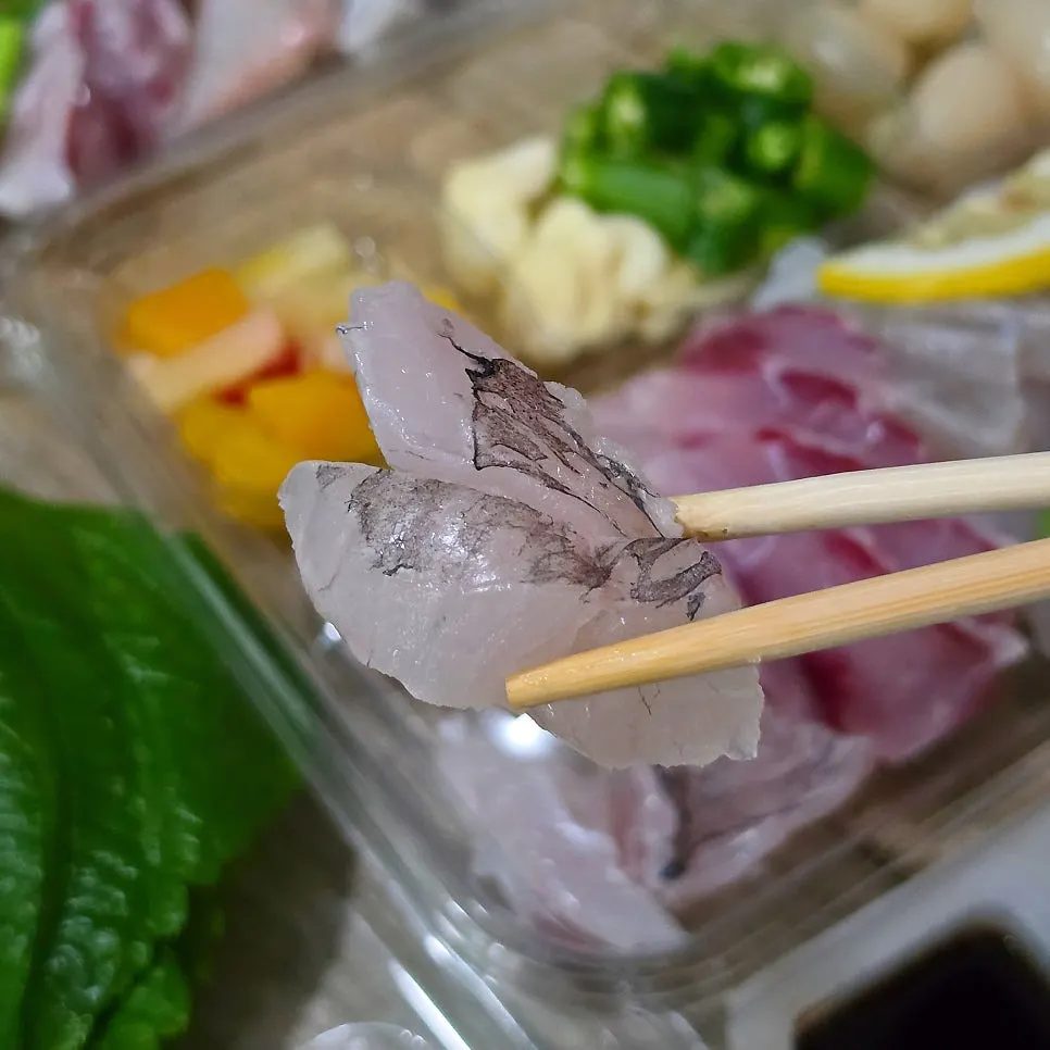 Close-up of thickly cut assorted sashimi