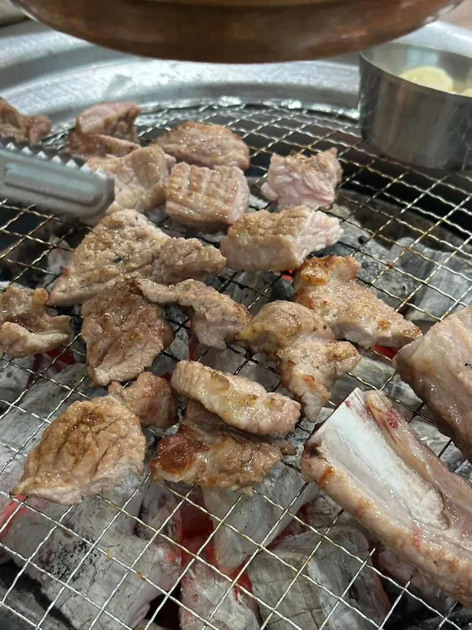 Yeoyejeong's fresh ribs browning nicely on the charcoal